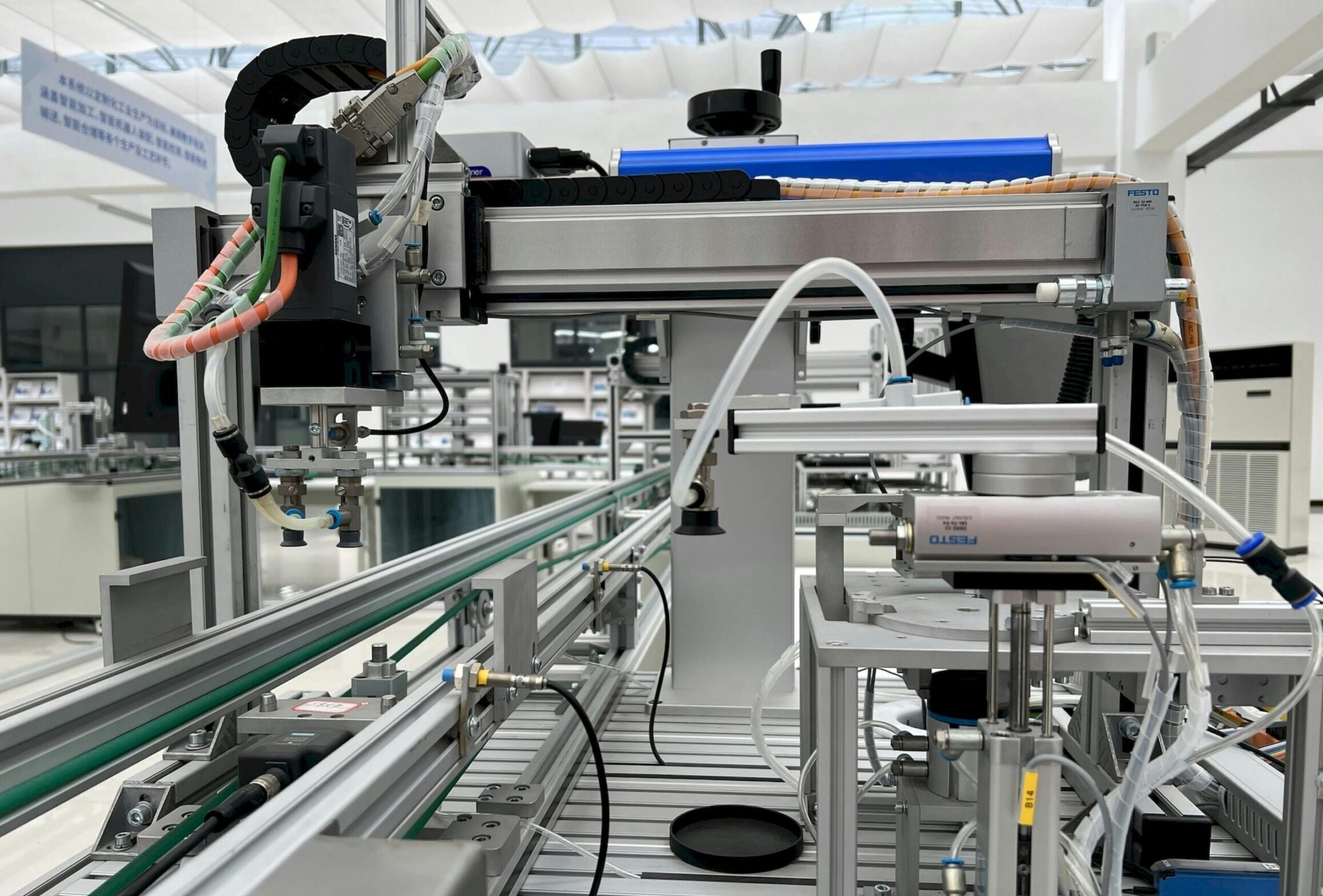 Close-up view of modern automation machinery in an industrial setting.